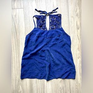 Banana Republic racerback blouse with lace back design and velvet-like material